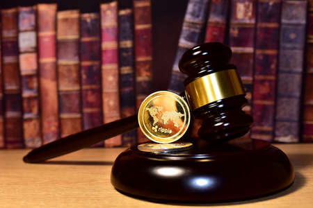 Judge hammer and XRP crypto coin. Justice courtroom. Ripple demands Bitcoin and Ethereum docs from...