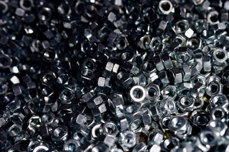 Background of screw bolts, Internal screw, bolts closeup, many screws. Factory equipment and...