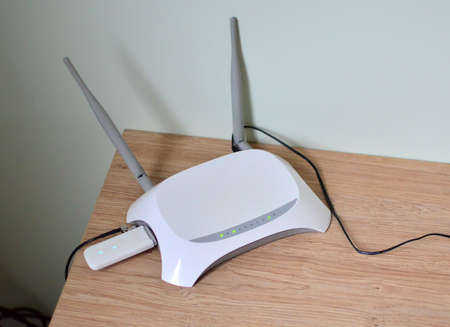 WiFi router with an antenna to enhance the Internet. Wireless network. Improve the signal, speed and...