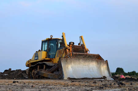 Track-type bulldozer, earth-moving equipment. Land clearing, grading, pool excavation, utility...