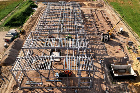 Construction of warehouse from metal structures. Industrial building on light gauge steel framing....