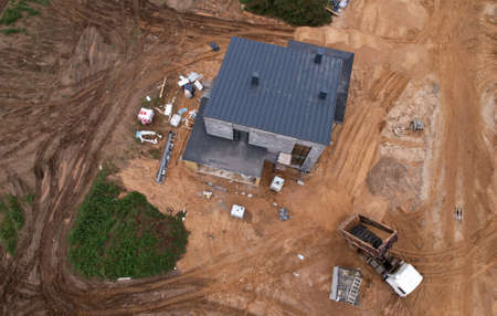 Building a country house of expanded-clay concrete blocks. Unfinished private home of ceramsite...