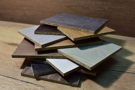 Samples of fibreboard panels with wood texture. Laminated CPD. Chipboard PVC edge. Wooden furniture...