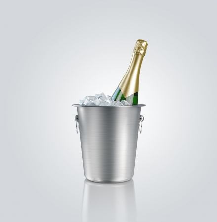 Bottle champagne in a bucket with iceの写真素材