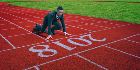 Businessman ready to sprint on starting line of the year 2018. Starting career, business concept 3d renderingの写真素材