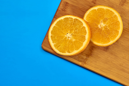 Food for fitness, healthy lifestyle, flat lay with fresh fat-burning fruits, slices of orange on the...