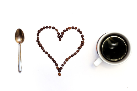 I love coffee. Shapes made from coffee beans. Isolated on white backgroundの写真素材