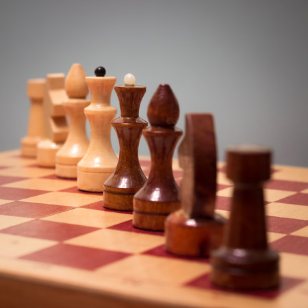 wooden chess board and piecesの写真素材