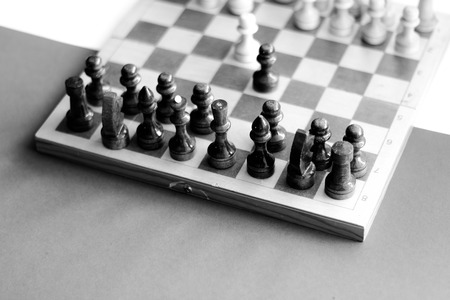 black white checkerboard with figures on black white backgroundの写真素材