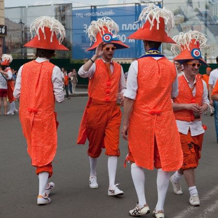 KHARKIV, UKRAINE - 09 JUNE: Holland football team supporters walk on a street of Kharkiv city before UEFA EURO 2012 game against Denmark on 9 June, 2012 in Kharkiv, Ukraineのeditorial素材