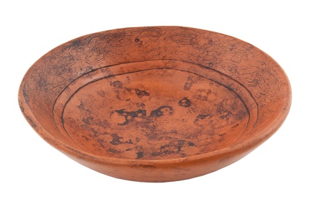 ancient plate from ceramics on a white backgroundの写真素材