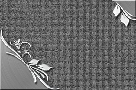 Silver textured plate with flower and leafsの写真素材