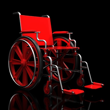 Red wheelchair on a glossy black surface.の写真素材