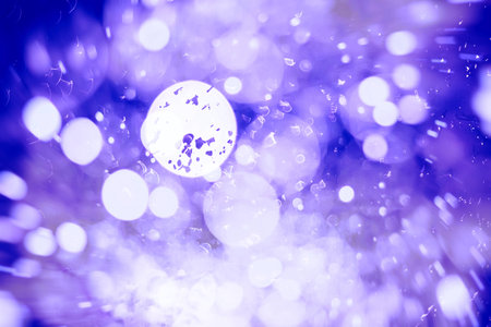 Bright light spots abstract bokeh blurred background textureの写真素材