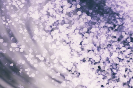 Festive Christmas background. Elegant abstract background with bokeh defocused lights and starsの写真素材