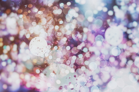 Festive Christmas background. Elegant abstract background with bokeh defocused lights and stars