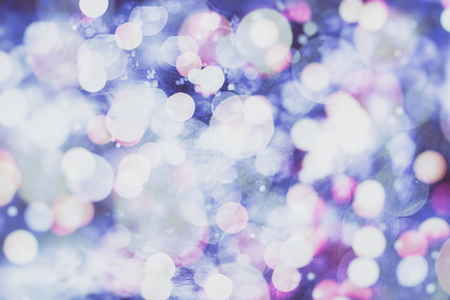 Festive Christmas background. Elegant abstract background with bokeh defocused lights and stars