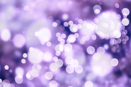 Festive Christmas background. Elegant abstract background with bokeh defocused lights and starsの写真素材