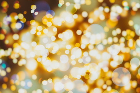 Festive elegant abstract background with bokeh lights and starsの写真素材