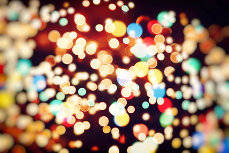 abstract background of sparkles and circles of the lit lit celebrations display.
