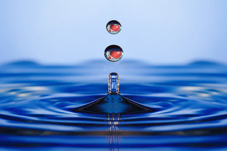 Falling into water dropletsの写真素材