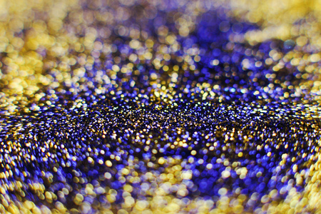 Festive background. Glitter vintage lights background . Christmas and New Year feast backgroundの写真素材