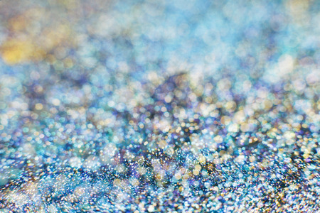 Festive background. Glitter vintage lights background . Christmas and New Year feast backgroundの写真素材