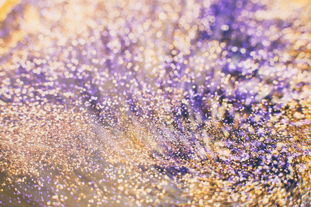 Festive background. Glitter vintage lights background . Christmas and New Year feast backgroundの写真素材