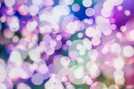 Abstract Festive background. Glitter vintage lights background with lights defocused. Christmas and...