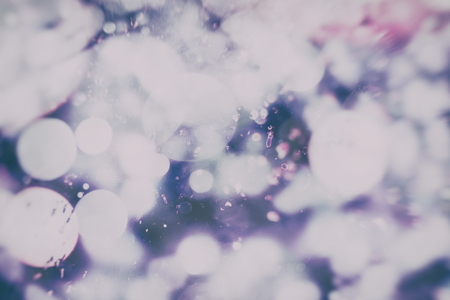 Abstract Festive background. Glitter vintage lights background with lights defocused. Christmas and...