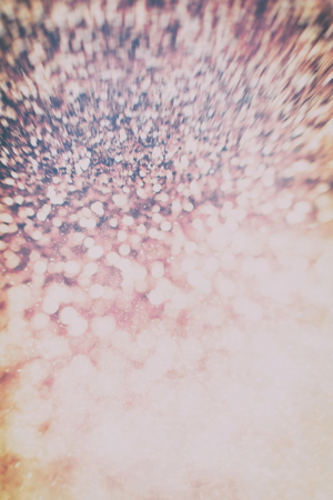 Abstract Festive background. Glitter vintage lights background with lights defocused.の写真素材