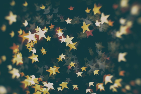 Abstract Festive background. Glitter vintage lights background with lights defocused.の写真素材