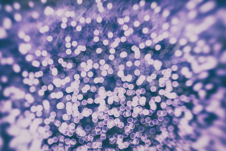 Abstract Festive background. Glitter vintage lights background with lights defocused.の写真素材