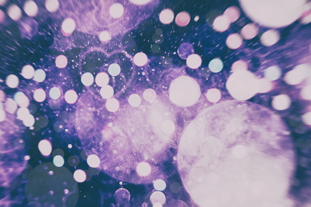 Abstract Festive background. Glitter vintage lights background with lights defocused.の写真素材