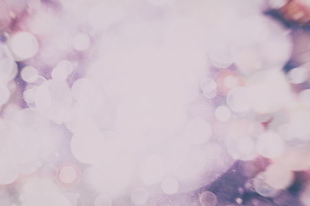 Abstract Festive background. Glitter vintage lights background with lights defocused.の写真素材