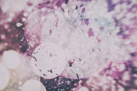 Abstract Festive background. Glitter vintage lights background with lights defocused.