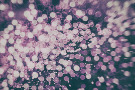 Christmas background with bokeh lightsの写真素材