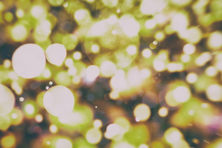 Christmas background with bokeh lightsの写真素材