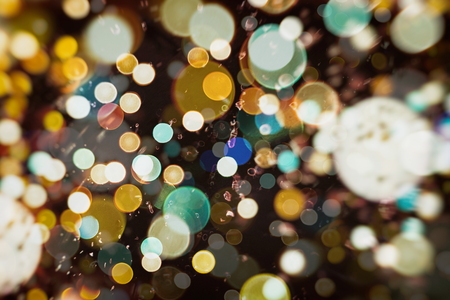 Christmas background with bokeh lightsの写真素材