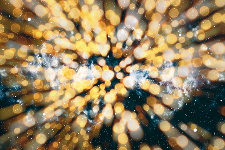Vintage Magic Background With Color Festive background with natural bokeh and bright golden lights.の写真素材