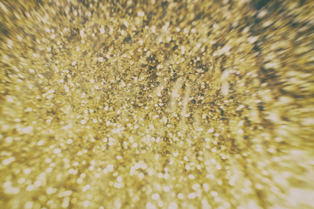 Abstract Festive background. Glitter vintage lights background with lights defocused. Christmas and New Year feast bokeh background with copyspace.の写真素材