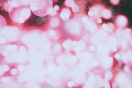Abstract Festive background. Glitter vintage lights background with lights defocused. Christmas and New Year feast bokeh background with copyspace.の写真素材