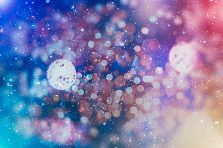 abstract blurred of blue and silver glittering shine bulbs lights background:blur of Christmas...