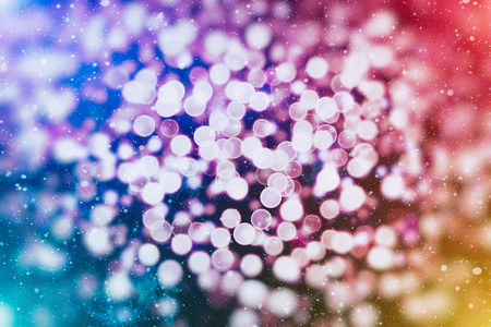 abstract blurred of blue and silver glittering shine bulbs lights backgroundの写真素材