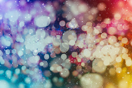 Festive Christmas background. Elegant abstract background with bokeh defocused lights and stars