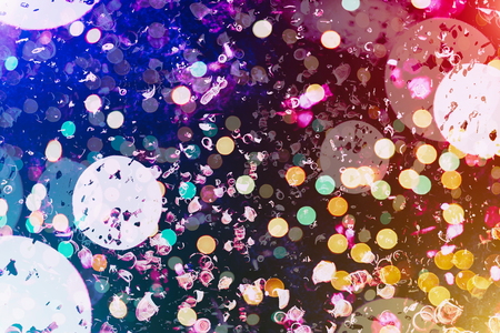 Abstract Festive background. Glitter vintage lights background with lights defocused. Christmas and...