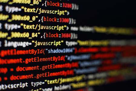 Code of web page displayed on a computer monitor