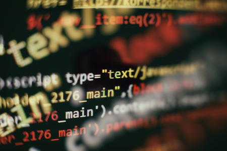 Code of web page displayed on a computer monitor