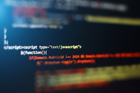Code of web page displayed on a computer monitorの写真素材