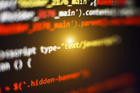 Code of web page displayed on a computer monitorの写真素材